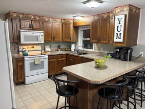 Private kitchen - Spacious Mackinaw Avenue Creekside Cottage (Cheboygan)