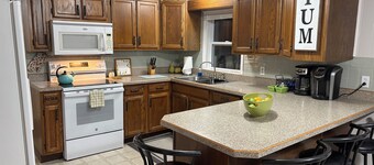 Spacious Mackinaw Avenue Creekside Cottage