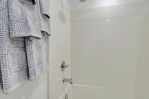 Hair dryer, towels, soap, shampoo