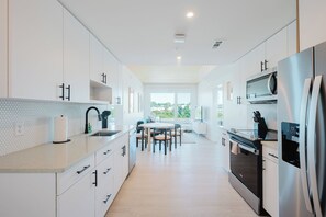 Apartment, 3 Bedrooms, Non Smoking | Private kitchen | Coffee/tea maker, toaster, freezer - Sentral Joinery East West (Charlotte)