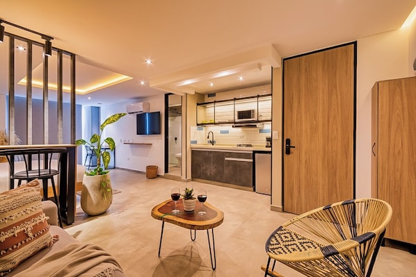 Family Apartment | Living area | 55-inch Smart TV with digital channels