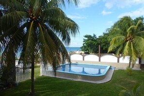 Outdoor pool - Adorable budget friendly room in vibrant Cozumel-Ocean Front Property (Cozumel)