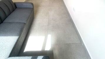 Suite, balkon, uitzicht op zee | Woonruimte