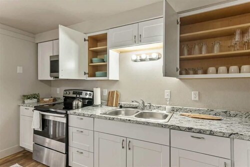 Fully Fenced Backyard, Close to Trails & Sites