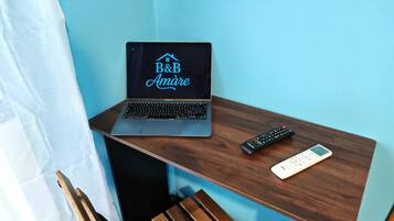 In-room safe, desk, laptop workspace, iron/ironing board