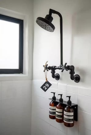 Shower, hair dryer, towels, soap