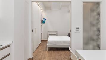 Comfort Apartment, Balcony | In-room safe, desk, laptop workspace, blackout curtains