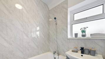 Shower, hair dryer, towels