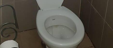 Shower, slippers, towels, soap