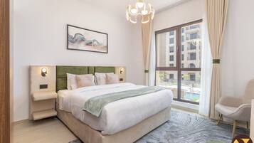 Luxury Apartment, Balcony, Pool View | In-room safe, iron/ironing board, cribs/infant beds, free WiFi