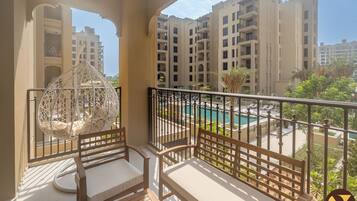 Luxury Apartment, Balcony, Pool View | Balcony