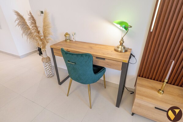 Luxury Apartment, Balcony, Pool View | Living area | 65-inch Smart TV with cable channels