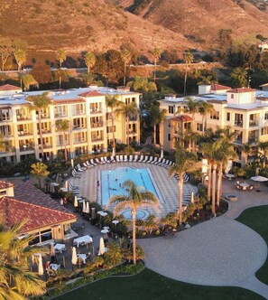 Outdoor pool, open 8:00 AM to 10:00 PM, pool umbrellas, sun loungers