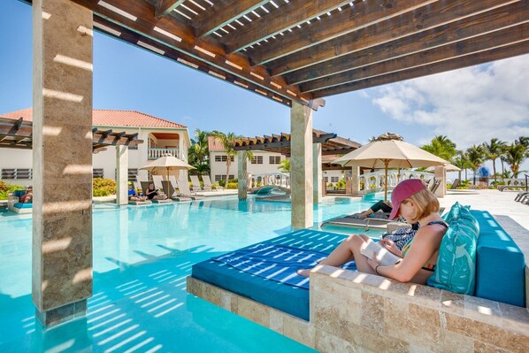 4 outdoor pools, free pool cabanas, pool umbrellas