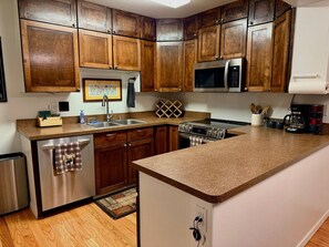 Dishwasher, cookware/dishes/utensils, dining tables - Nordic Retreat with private Finnish Sauna (Anchorage)