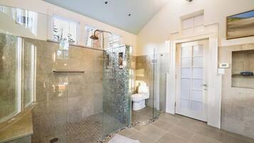 Shower, hair dryer, towels, shampoo