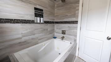 Shower, jetted bath, hair dryer, towels