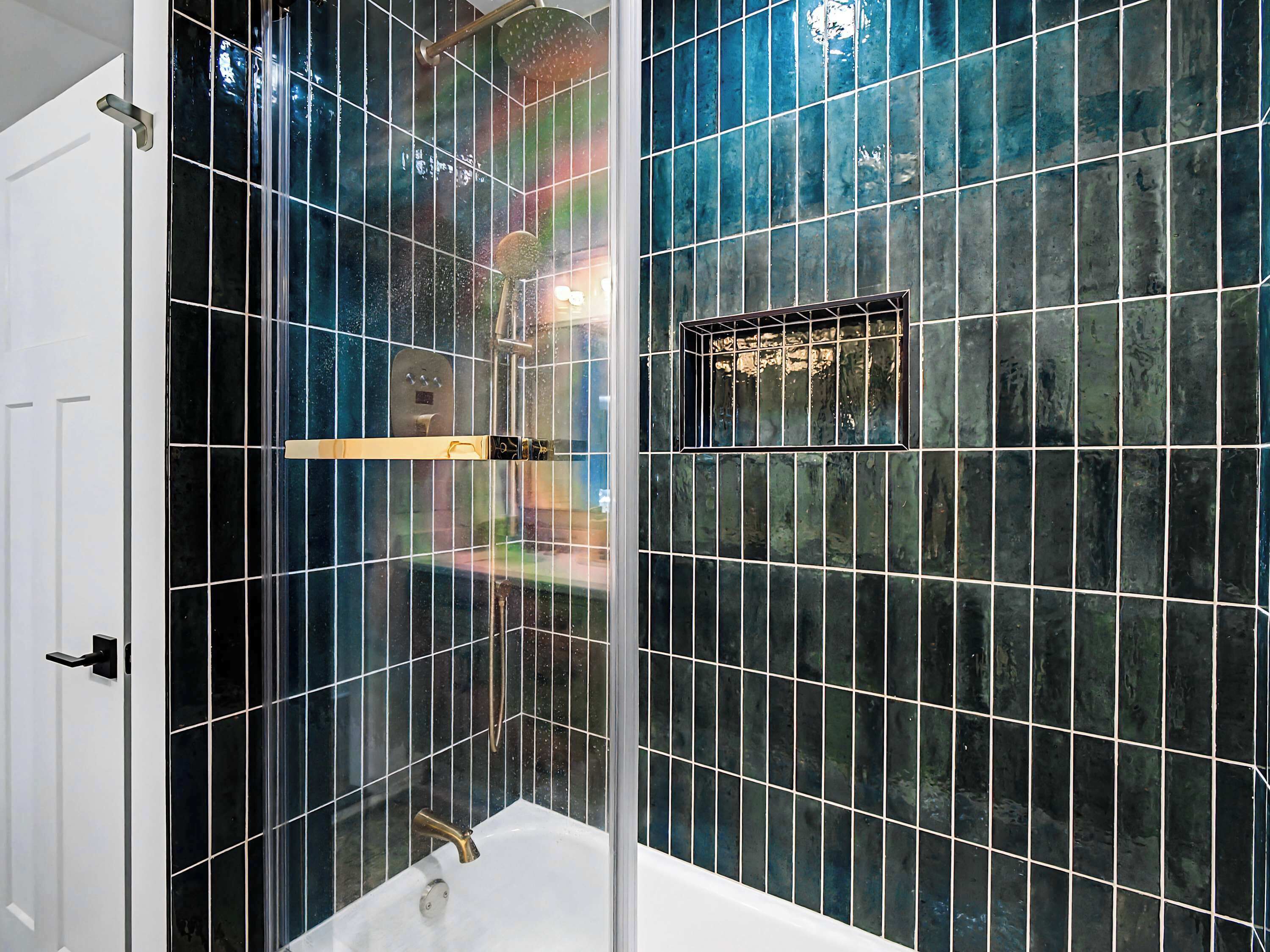 Shower, hair dryer, towels, shampoo