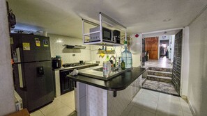 Fridge, stovetop, dishwasher, cookware/dishes/utensils - Apartahotel Sueños Libres Necocli  (Necoclí)