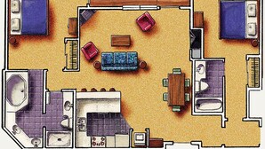 Plano de un cuarto de hotel que muestra una cama, un sofá, una mesa de comedor, una zona de cocina y un baño.