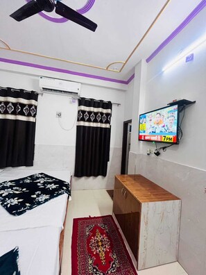 Triple Room, Balcony, City View | Iron/ironing board, free WiFi