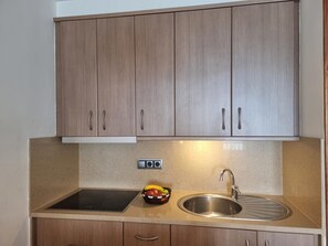 Fridge, microwave, coffee/tea maker, toaster