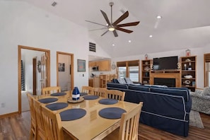 Top Level Living Room and Dining Area - 4 Bedroom Family-Friendly: 2 King Suites: Walk to Beach, Hot Tub & Game Room! (Kill Devil Hills)
