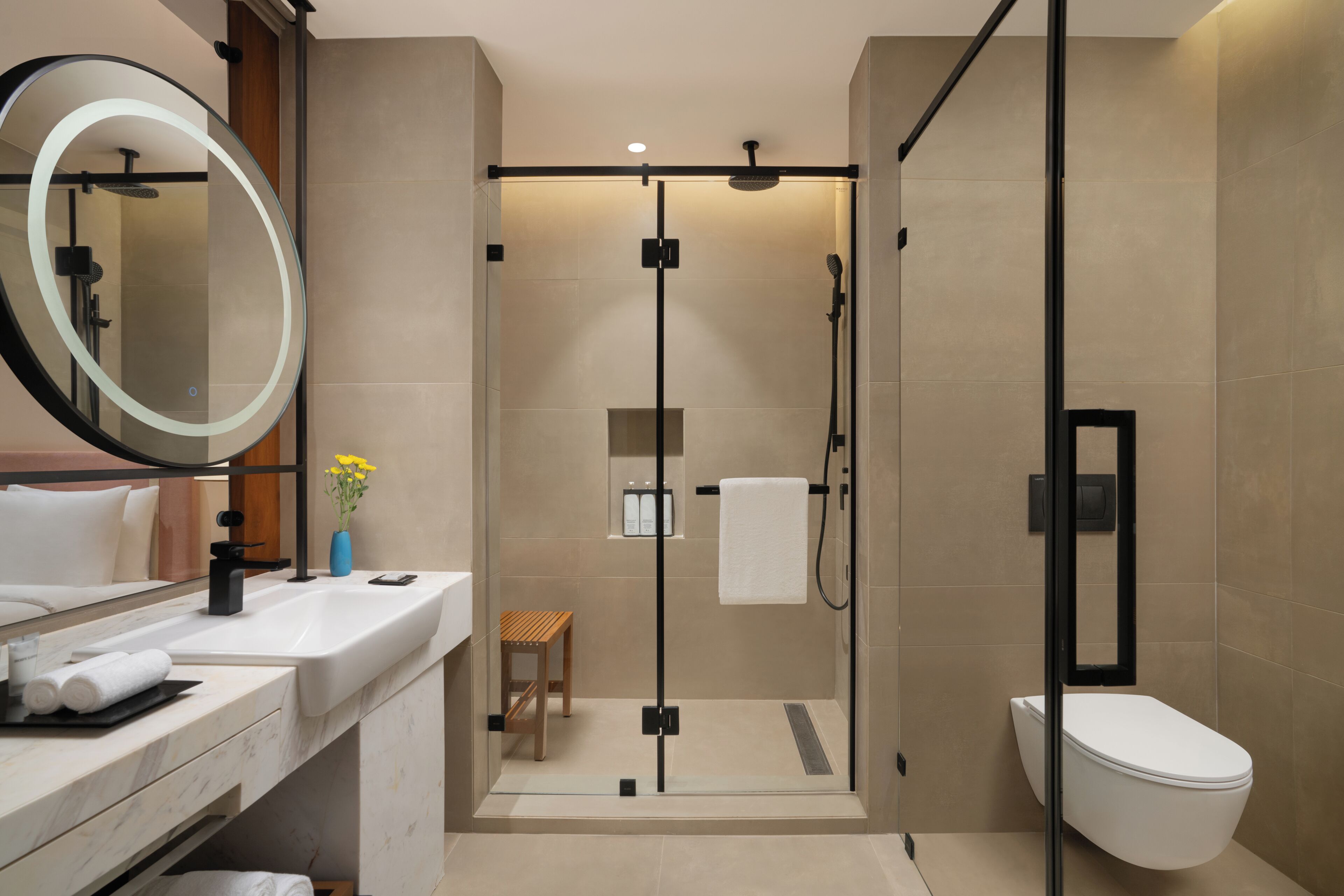 Shower, hydromassage showerhead, designer toiletries, hair dryer