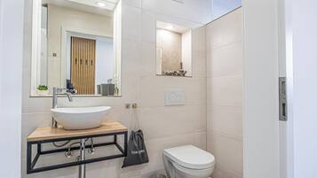 Hair dryer, towels, soap, shampoo