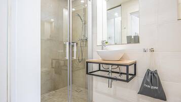 Hair dryer, towels, soap, shampoo