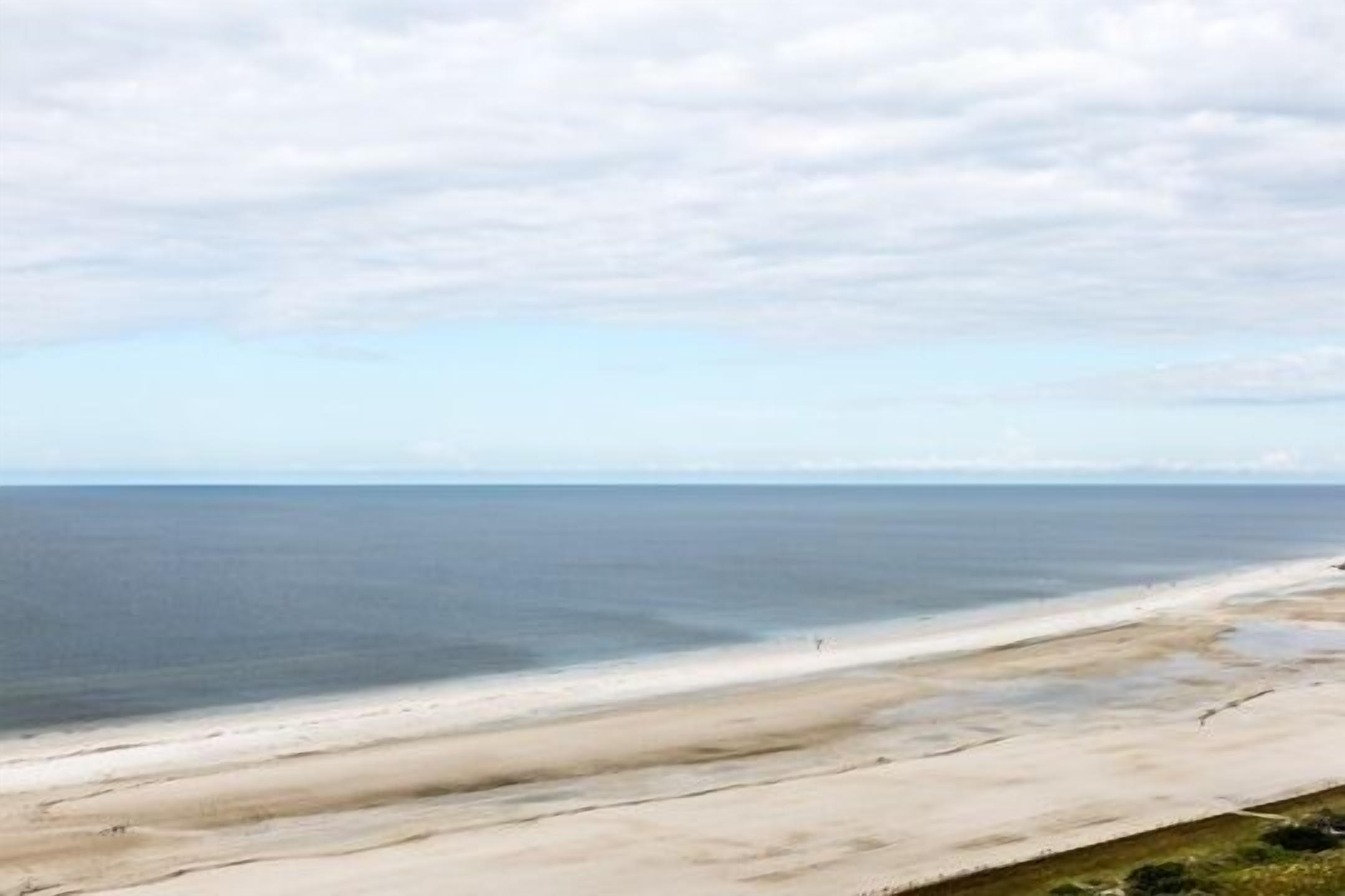 On the beach, sun loungers, beach towels