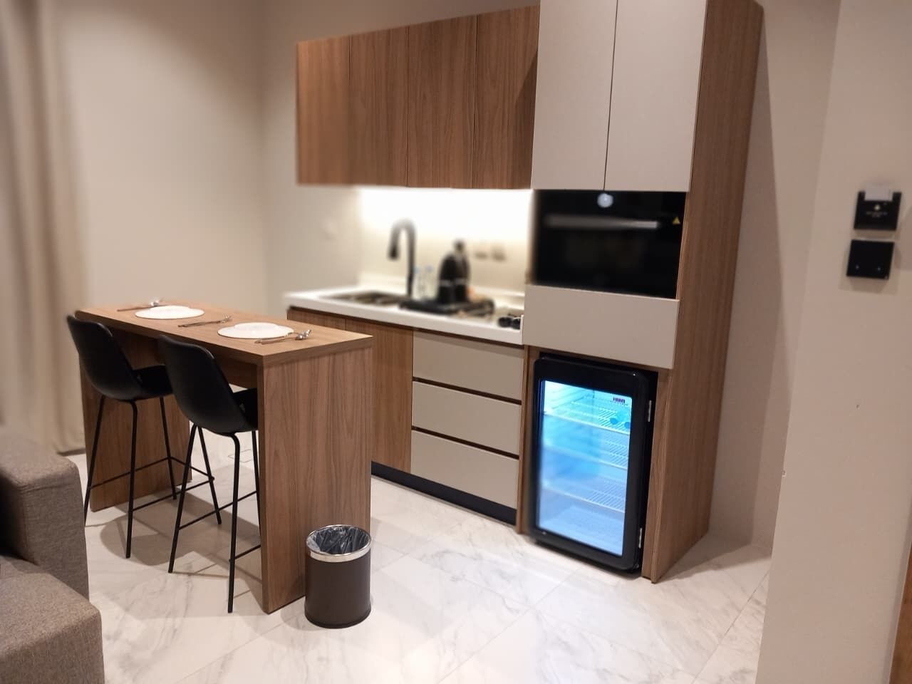 Espresso maker, coffee/tea maker, mini-fridge, microwave