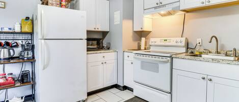 Fridge, microwave, stovetop, coffee/tea maker