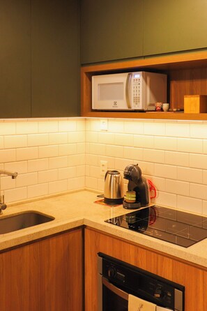 Private kitchen - Charm of Redemption | Studio across from the park (Porto Alegre)
