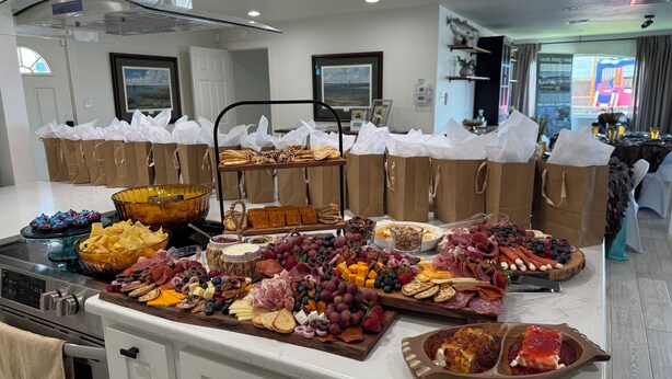 A buffet with various food items and paper bags. - Waterfront 3-bedroom private dock for boat access in Corpus Christi (Corpus Christi)