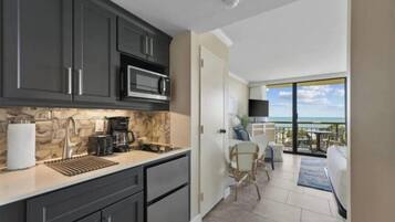 Fridge, microwave, coffee/tea maker, toaster