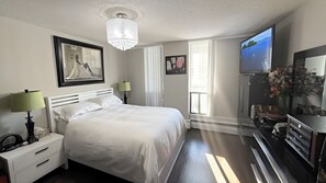 Iron/ironing board, Internet, bed sheets - Effortless Downtown Calgary Executive Condo | 6 to 8 Month Occupancy | $1,980/mo (Calgary)
