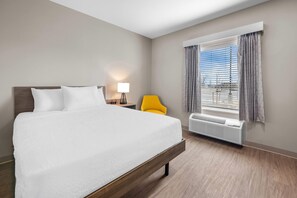 Desk, laptop workspace, blackout curtains, free WiFi