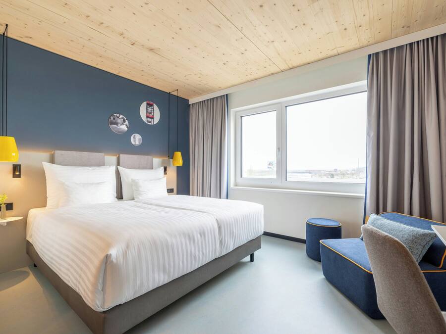 Hypo-allergenic bedding available, in-room safe, desk, laptop workspace