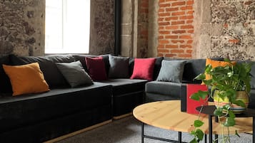 Classic Loft | Living area | 32-inch flat-screen TV with cable channels