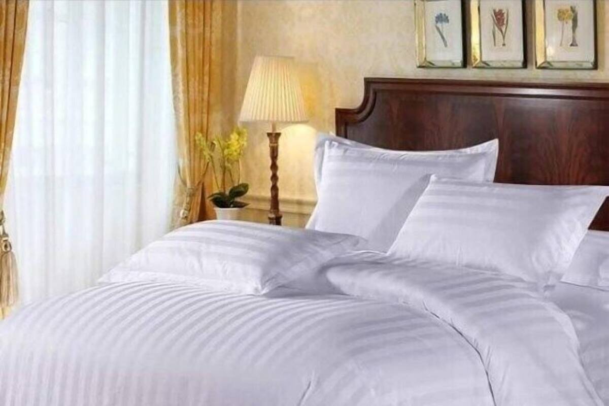Kamar Double Standar | Wi-Fi gratis dan seprai linen