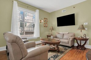 TV, fireplace - Newly Renovated Victorian APT, Steps from Forsyth Park (Savannah)