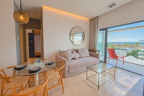 Deluxe Apartment, Sea View, Tower | Living room - LUX 1 BDR OCEAN VIEW 1 BLOCK TO BEACH (Playa del Carmen)
