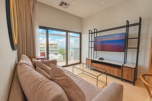 Departamento Deluxe, vista al mar, torre | Sala de estar