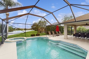 A heated pool - Luxury Waterfront Escape with Heated Pool, Hot Tub, & Outdoor Patio! 🌊 (Melbourne)