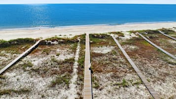 On the beach, sun-loungers, beach towels