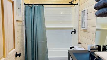 Hair dryer, towels, soap, shampoo