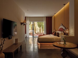 Habitación doble Deluxe | Artículos del minibar gratis y decoración personalizada