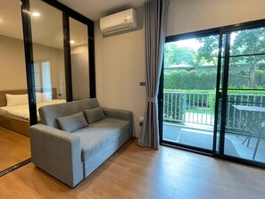 Apartment, Patio, Pool View | Iron/ironing board, free WiFi - The Title Rawai Aparthotel by HSS (Rawai)