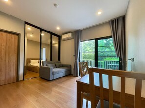 Apartment, Patio, Pool View | Iron/ironing board, free WiFi - The Title Rawai Aparthotel by HSS (Rawai)